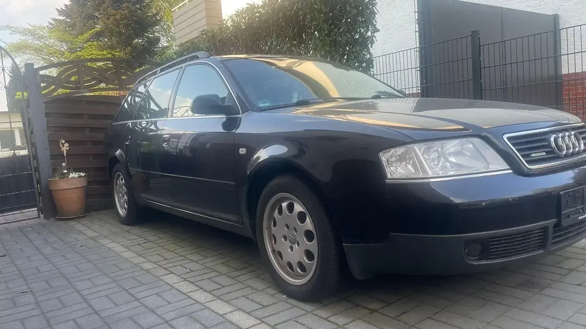 Używany Audi A6 165 KM (121 kW) 1999 Czarny Kombi