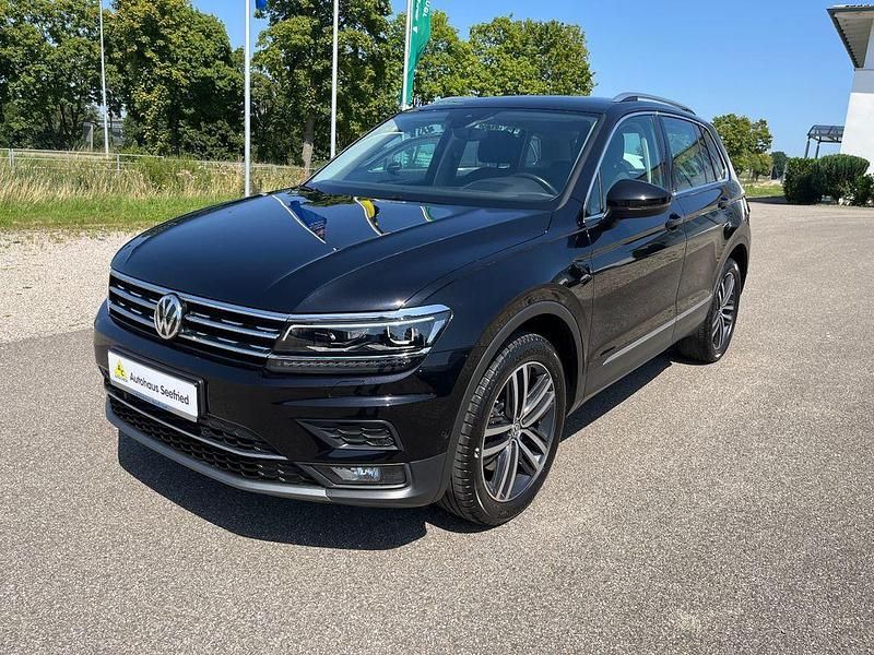 Deep black (metallic) Gebraucht 2020 VW Tiguan Highline SUV | 30.600 € (Fairer Preis) - Bild 1/4