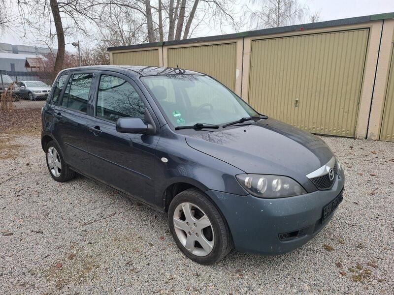 Grau Gebraucht 2007 Mazda 2 Exclusive Limousine | 390 € (Superpreis) - Bild 1/4