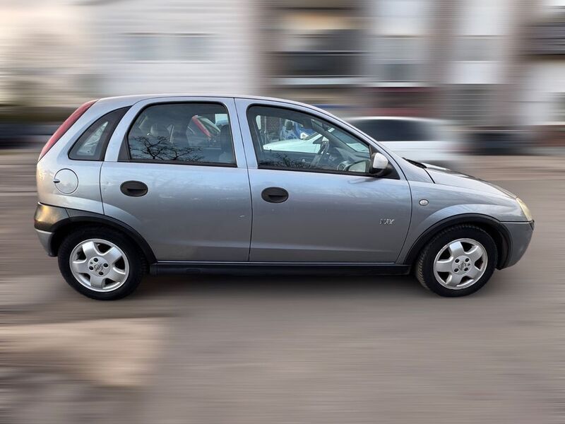 Second-hand Opel Corsa Njoy 75 CP (55 kW) 2003 Argintiu Berlinǎ