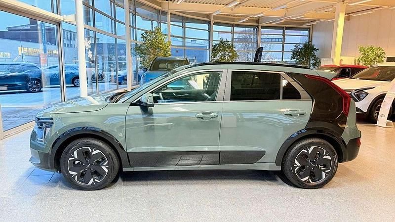 Cityscape grün met. Gebraucht 2024 Kia Niro Inspiration SUV | 35.565 € (Fairer Preis) - Bild 1/4