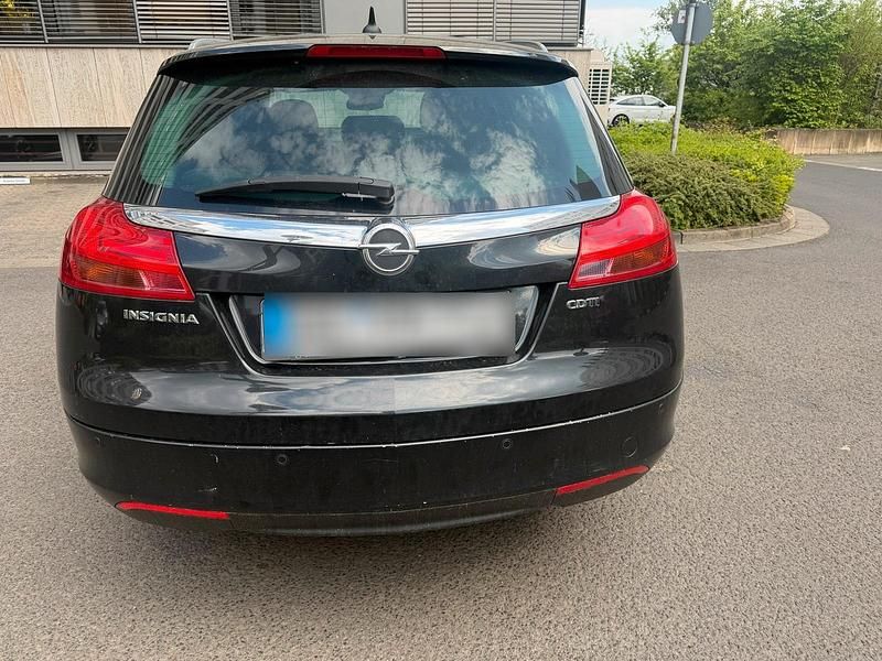 Używany Opel Insignia 160 KM (117 kW) 2013 Czarny Kombi