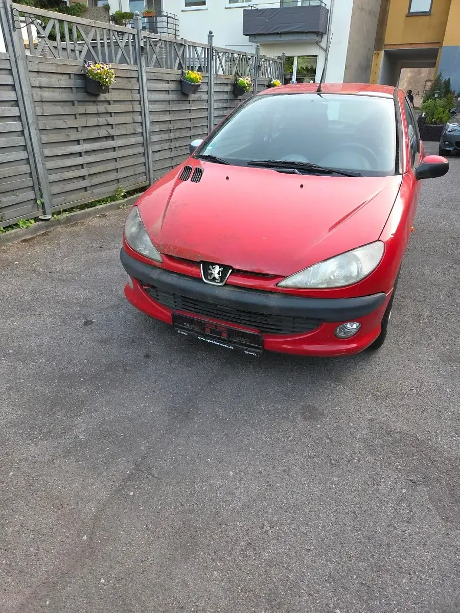 Używany Peugeot 206 78 KM (57 kW) 2004 Czerwony Hatchback