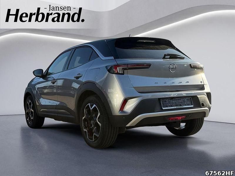 Gebraucht Opel Mokka-e Ultimate 100 kW (136 PS) 2022 Kontrast grau/quarz silber SUV