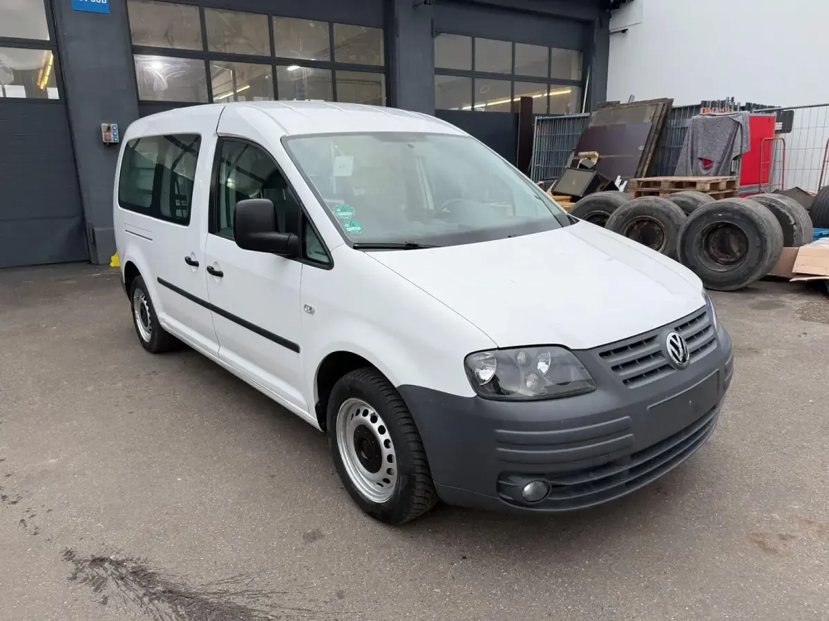 Second-hand VW Caddy Maxi 105 CP (77 kW) 2010 Alb Monovolum