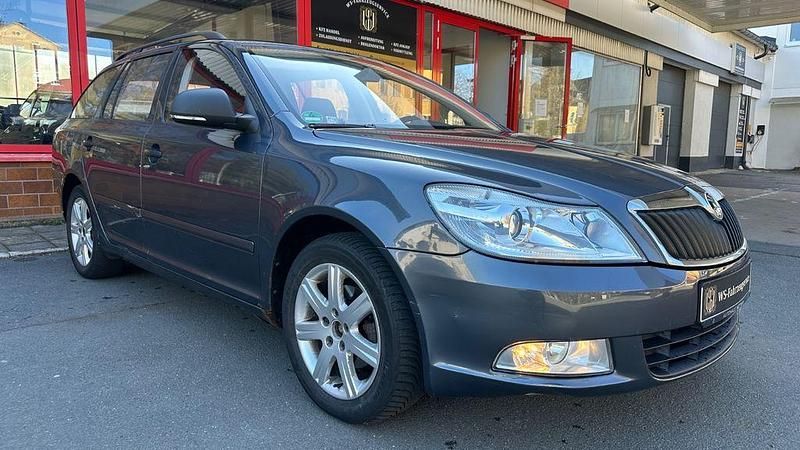 Używany Skoda Octavia 105 KM (77 kW) 2011 Szary Kombi