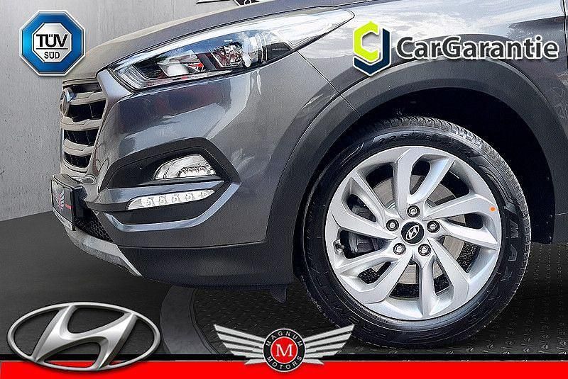 Grau Gebraucht 2017 Hyundai Tucson Classic SUV | 14.490 € (Fairer Preis) - Bild 1/4