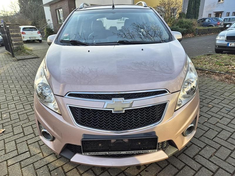 Andere außenfarben Gebraucht 2011 Chevrolet Spark Kleinwagen | 2.490 € - Bild 1/4