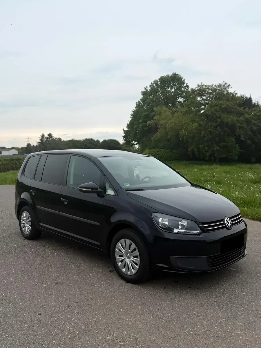 Gebraucht VW Touran Trendline 105 PS (77 kW) 2012 Schwarz Van / Kleinbus