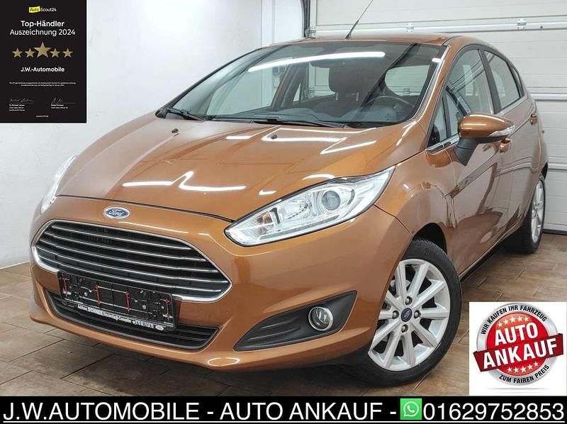 Torinobraun metallic Gebraucht 2016 Ford Fiesta Titanium Kleinwagen | 4.799 € (Superpreis) - Bild 1/4