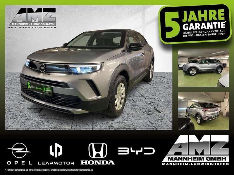 Lack grau artense/typ aussenve Gebraucht 2023 Opel Mokka-e Edition SUV | 16.990 € (Superpreis) - Bild 1/4