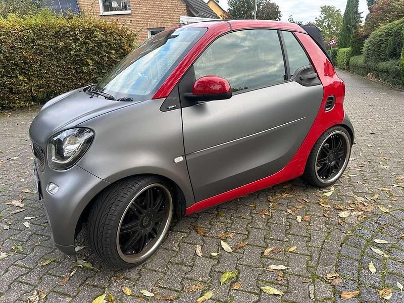 Jupiterrot Gebraucht 2016 Smart ForTwo Cabrio Brabus Cabrio | 11.900 € (Guter Preis) - Bild 1/4