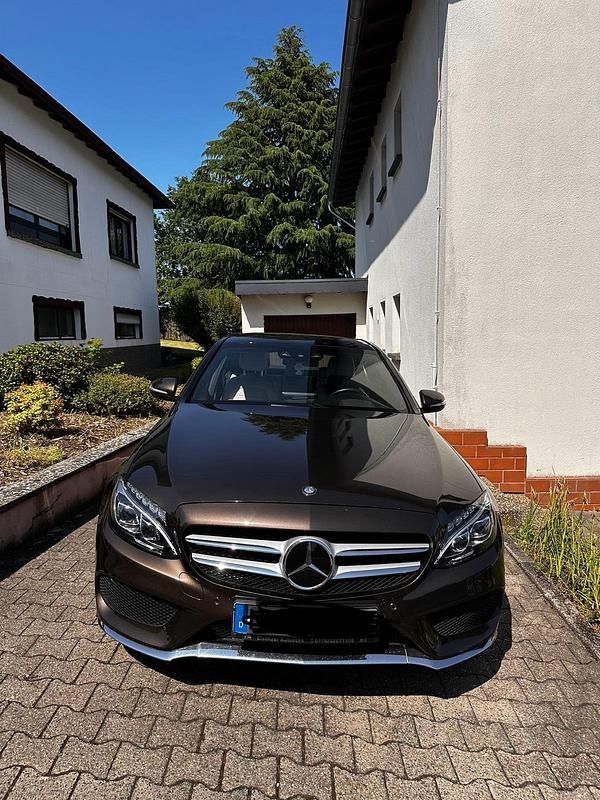 Braun Gebraucht 2014 Mercedes C300 Limousine | 19.800 € - Bild 1/4