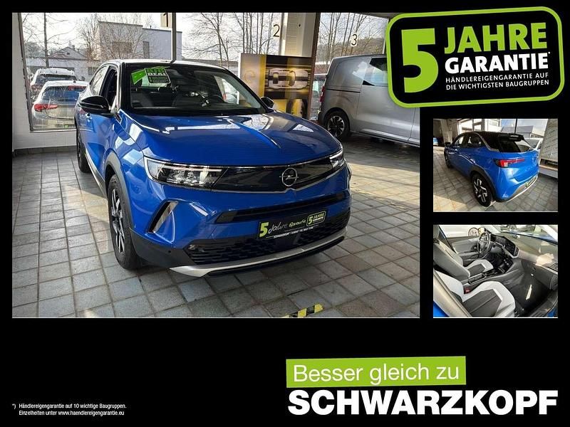 Perl blau/voltaik blau Gebraucht 2022 Opel Mokka-e SUV | 16.440 € (Fairer Preis) - Bild 1/4