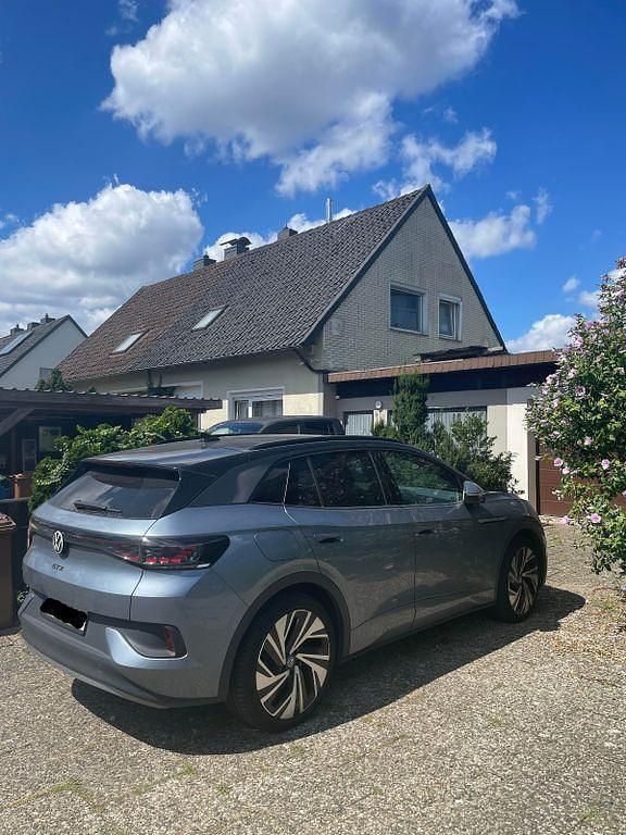 Blau Gebraucht 2022 VW ID.4 GTX SUV | 31.900 € (Superpreis) - Bild 1/3