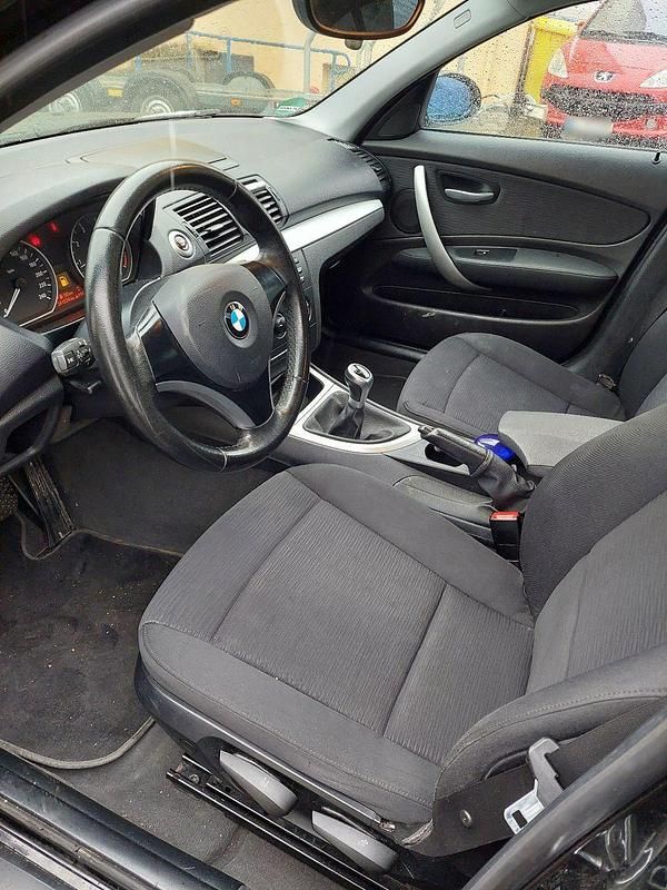 Gebraucht BMW 116 122 PS (89 kW) 2008 Schwarz Kleinwagen