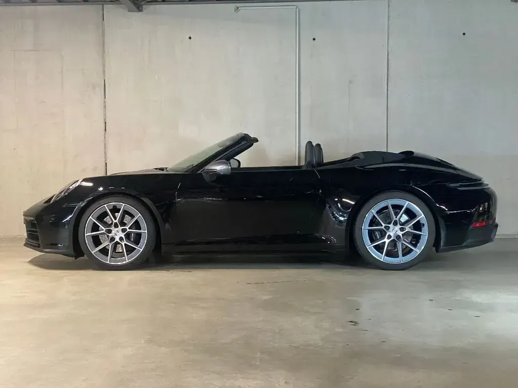 Gebraucht Porsche 992 394 PS (289 kW) 2025 Schwarz (metallic) Cabrio