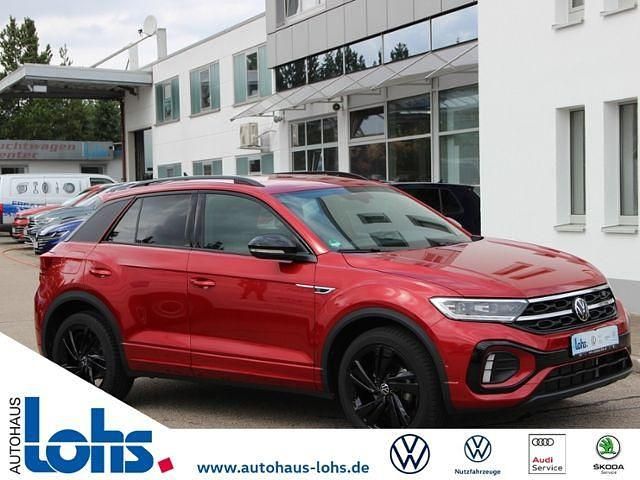 Kings red metallic (metallic) Gebraucht 2024 VW T-Roc Style SUV | 33.480 € (Etwas zu teuer) - Bild 1/4