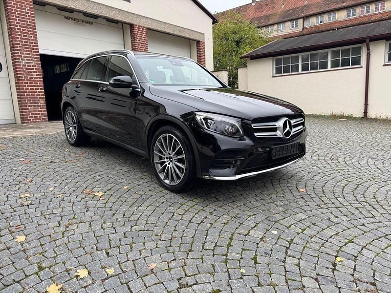 Schwarz Gebraucht 2015 Mercedes GLC250 AMG line SUV | 24.380 € (Fairer Preis) - Bild 1/4