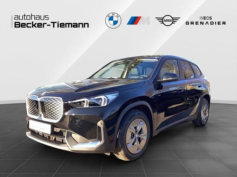 Schwarz ii Gebraucht 2024 BMW iX1 SUV | 37.301 € (Superpreis) - Bild 1/4