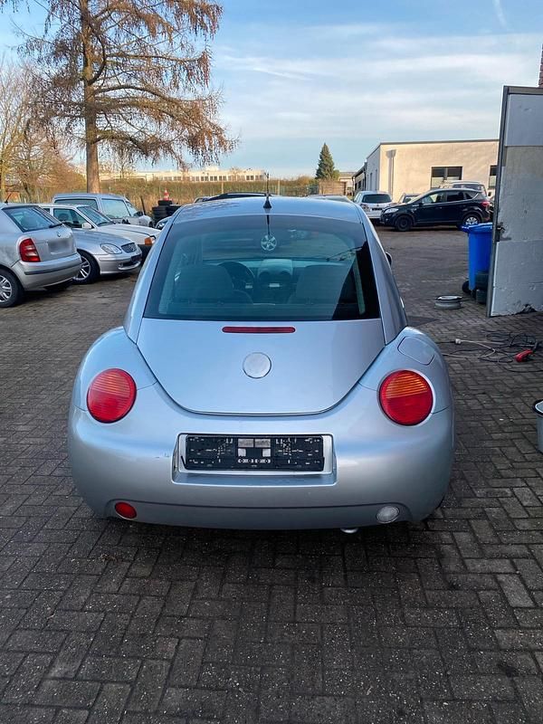 Gebraucht VW New Beetle 75 PS (55 kW) 2003 Silber Kleinwagen