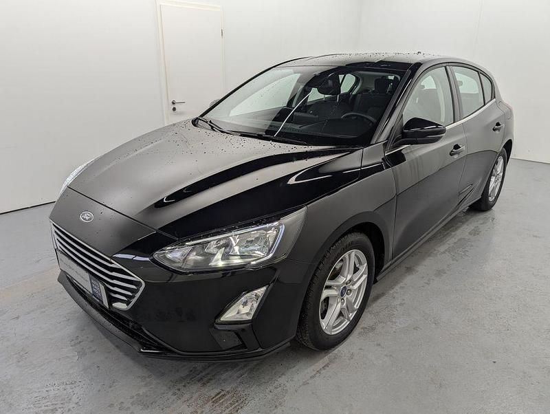 Obsidianschwarz Gebraucht 2021 Ford Focus Cool & Connect Limousine | 19.250 € (Fairer Preis) - Bild 1/4