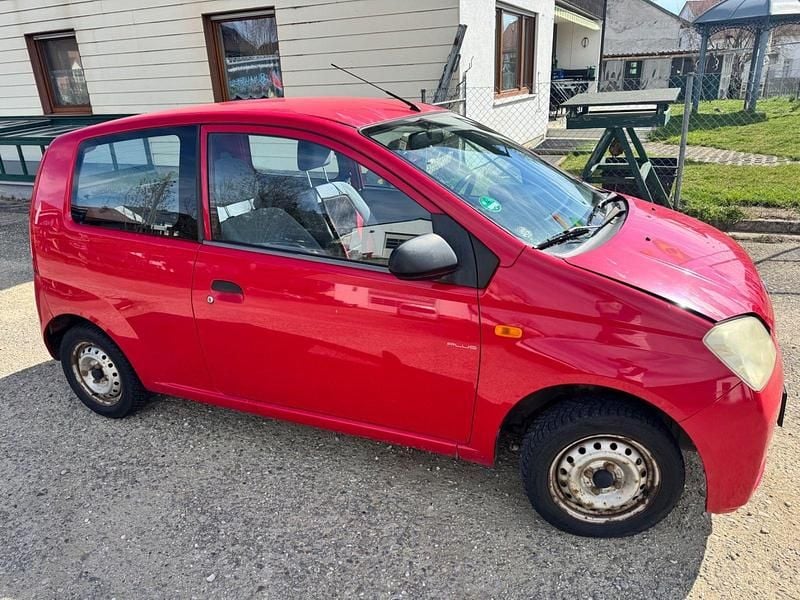 Gebraucht Daihatsu Cuore 58 PS (42 kW) 2003 Rot Kleinwagen