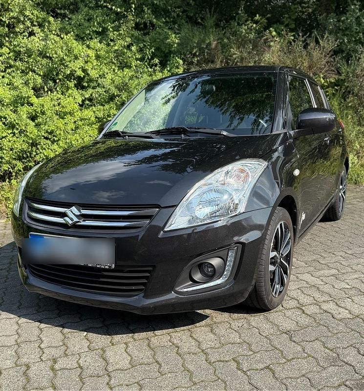 Schwarz Gebraucht 2016 Suzuki Swift Kleinwagen | 9.900 € - Bild 1/4