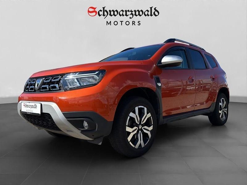 Orange Gebraucht 2021 Dacia Duster Prestige SUV | 17.490 € (Fairer Preis) - Bild 1/4