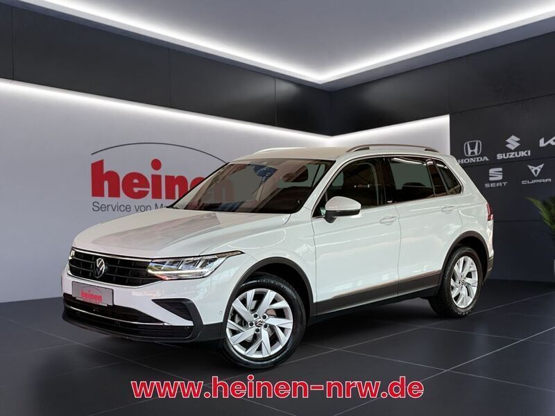 Pure white uni Gebraucht 2023 VW Tiguan Move SUV | 26.209 € (Superpreis) - Bild 1/4