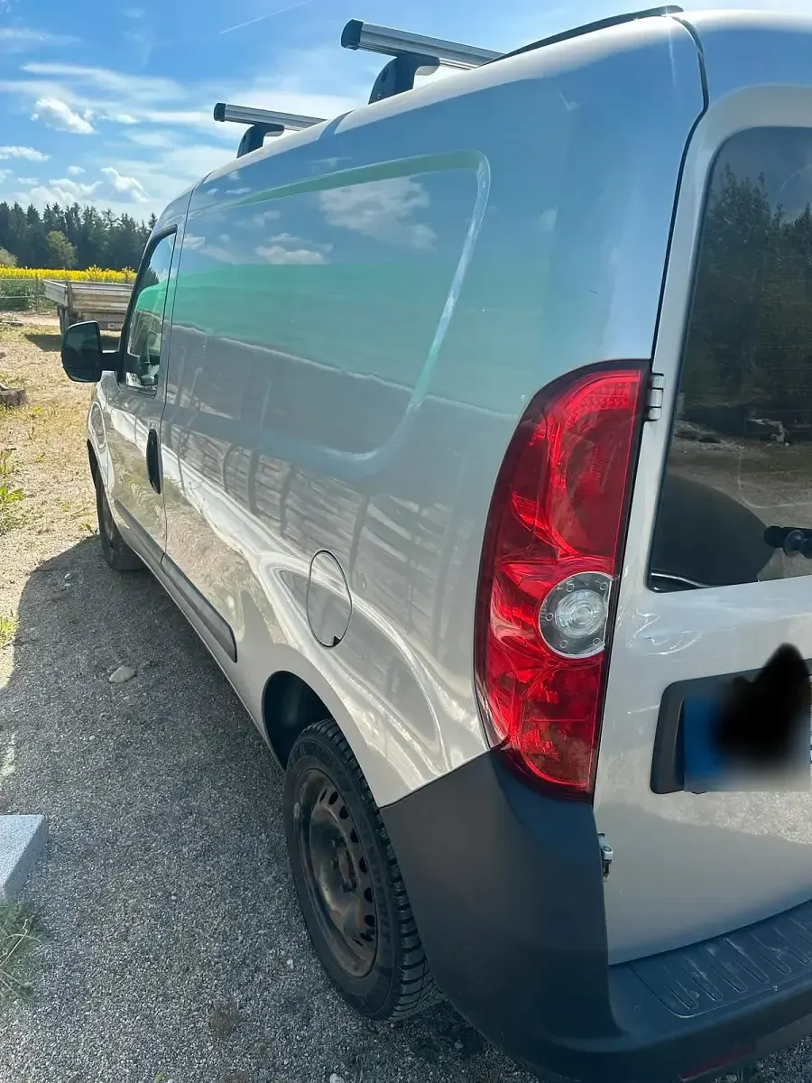 Używany Opel Combo 90 KM (66 kW) 2014 Srebrny Minivan