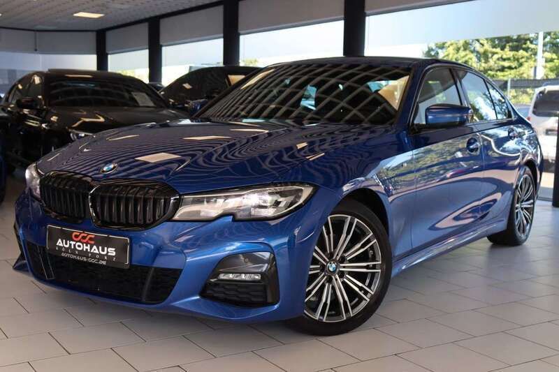 Portimao blau metallic Gebraucht 2021 BMW 320e Shadowline Limousine | 29.890 € (Teuer) - Bild 1/4