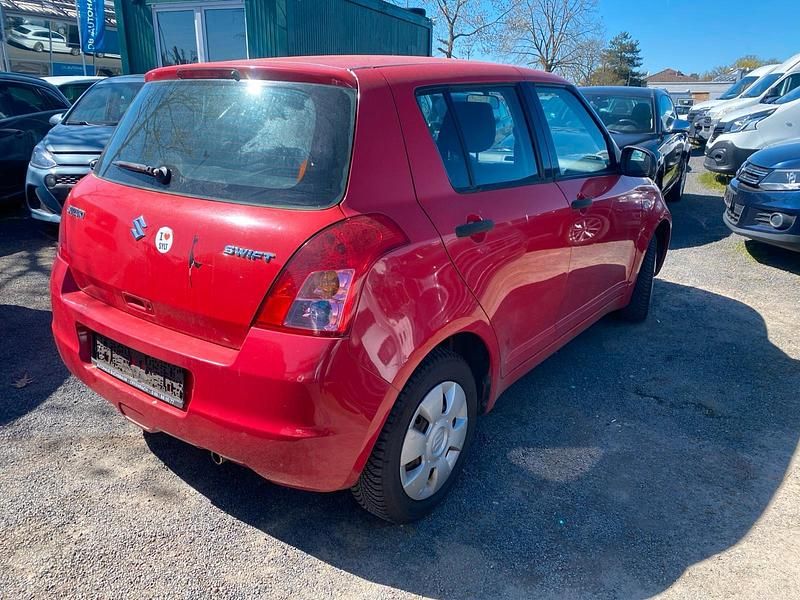 Second-hand Suzuki Swift 94 CP (69 kW) 2009 Roșu Hatchback