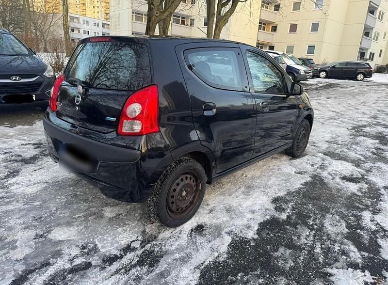 Gebraucht Nissan Pixo 68 PS (50 kW) 2011 Schwarz Kleinwagen