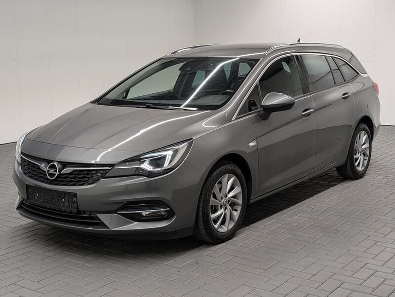 Grau (quarzgraumet.) Gebraucht 2020 Opel Astra Elegance Kombi | 11.480 € (Fairer Preis) - Bild 1/4