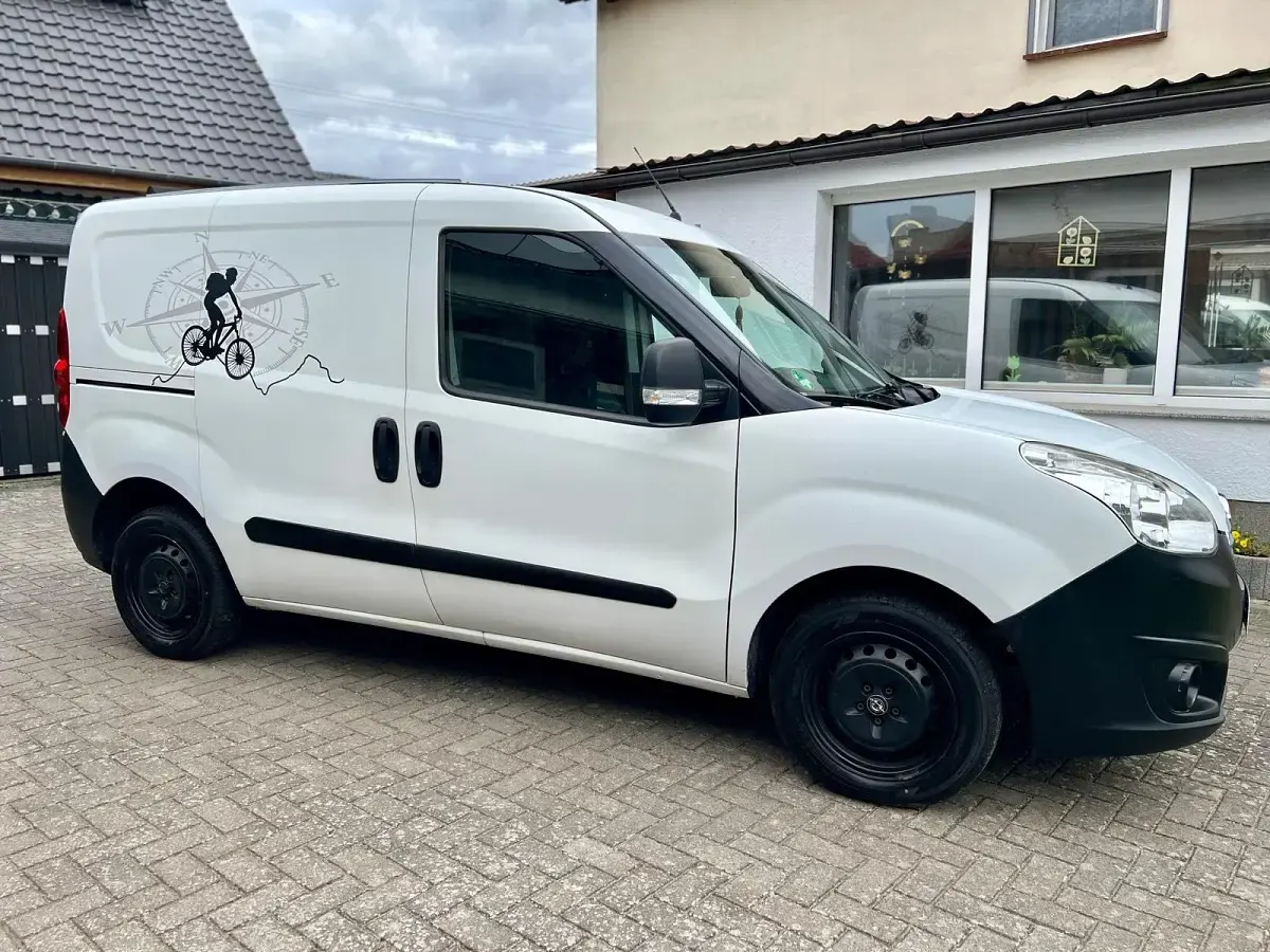 Używany Opel Combo 69 KM (50 kW) 2013 Biały Minivan