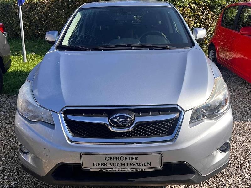 Ice silver met. e1u Gebraucht 2015 Subaru XV Comfort SUV | 15.400 € - Bild 1/4