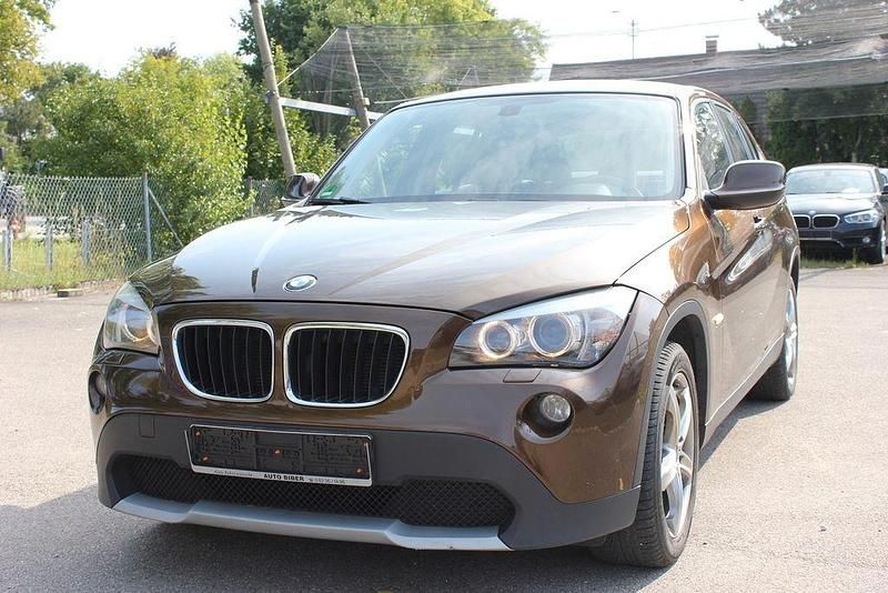 Braun Gebraucht 2011 BMW X1 Sport Line SUV | 5.890 € (Fairer Preis) - Bild 1/4
