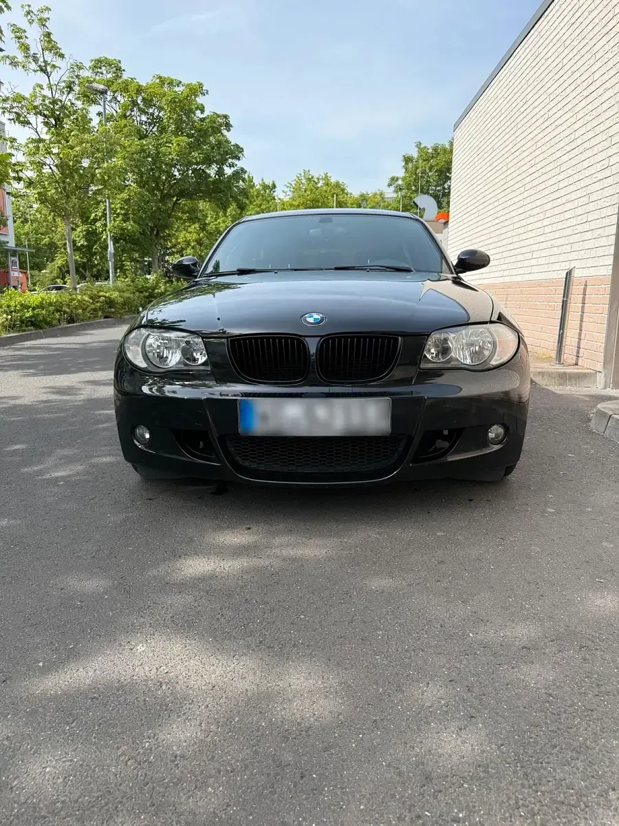 Second-hand BMW 116 122 CP (89 kW) 2010 Negru Hatchback