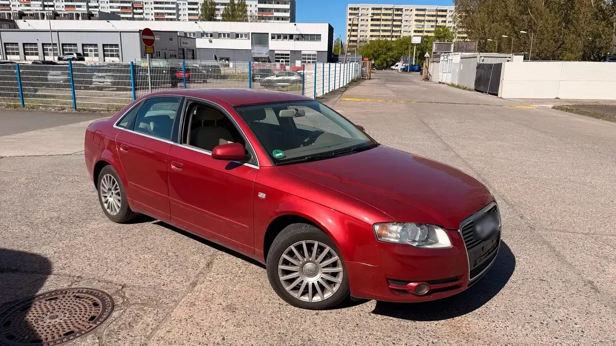 Używany Audi A4 130 KM (95 kW) 2006 Czerwony Sedan/Limuzyna