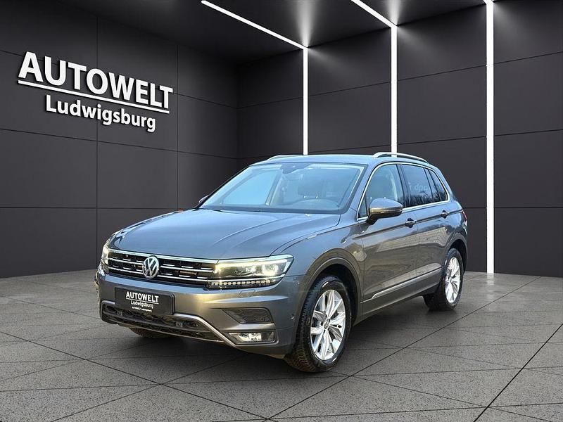 Grau Gebraucht 2017 VW Tiguan Highline SUV | 23.477 € (Superpreis) - Bild 1/4