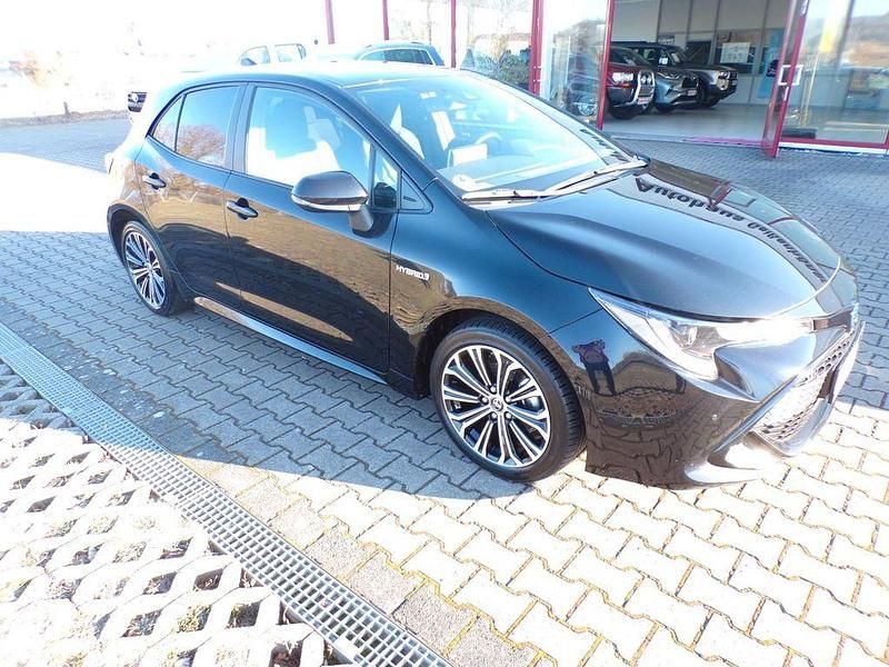 Gebraucht Toyota Corolla Hybrid Club 122 PS (89 kW) 2019 Schwarz Limousine
