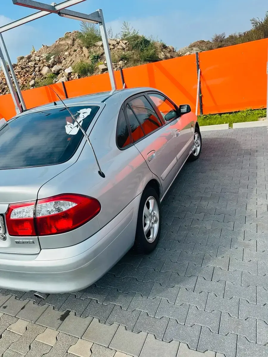 Second-hand Mazda 626 116 CP (85 kW) 2000 Argintiu Berlinǎ