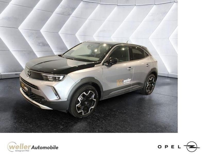 Grau Gebraucht 2023 Opel Mokka-e Ultimate SUV | 25.840 € (Teuer) - Bild 1/4