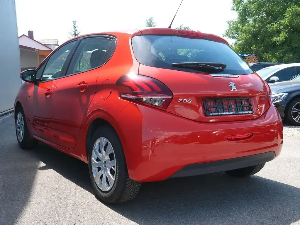 Gebraucht Peugeot 208 Active 82 PS (60 kW) 2018 Orange Kleinwagen
