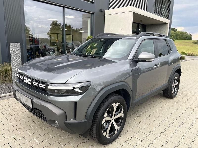 Grau Neu 2025 Dacia Duster Journey SUV | 26.430 € (Guter Preis) - Bild 1/4