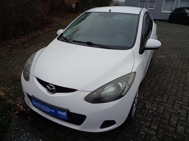 Arachneweiß metallic Gebraucht 2009 Mazda 2 Inclusive Kleinwagen | 4.900 € (Teuer) - Bild 1/4