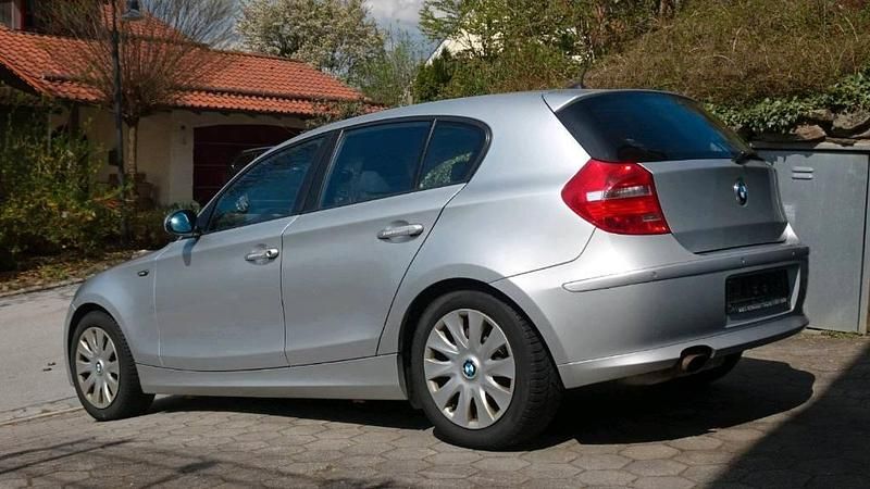 Second-hand BMW 116 122 CP (89 kW) 2009 Argintiu Hatchback