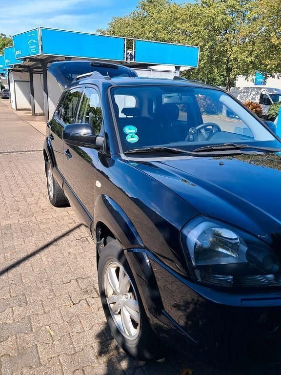 Schwarz Gebraucht 2010 Hyundai Tucson GLS SUV | 4.299 € (Superpreis) - Bild 1/4