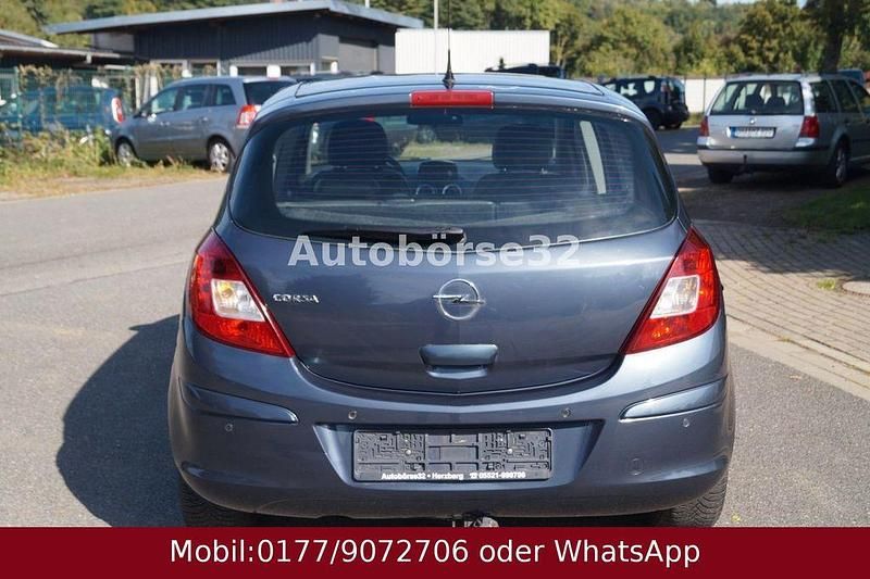 Usado Opel Corsa Innovation 90 HP (66 kW) 2010 Cinzento Citadino